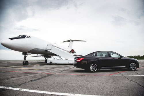 private jet and luxury car